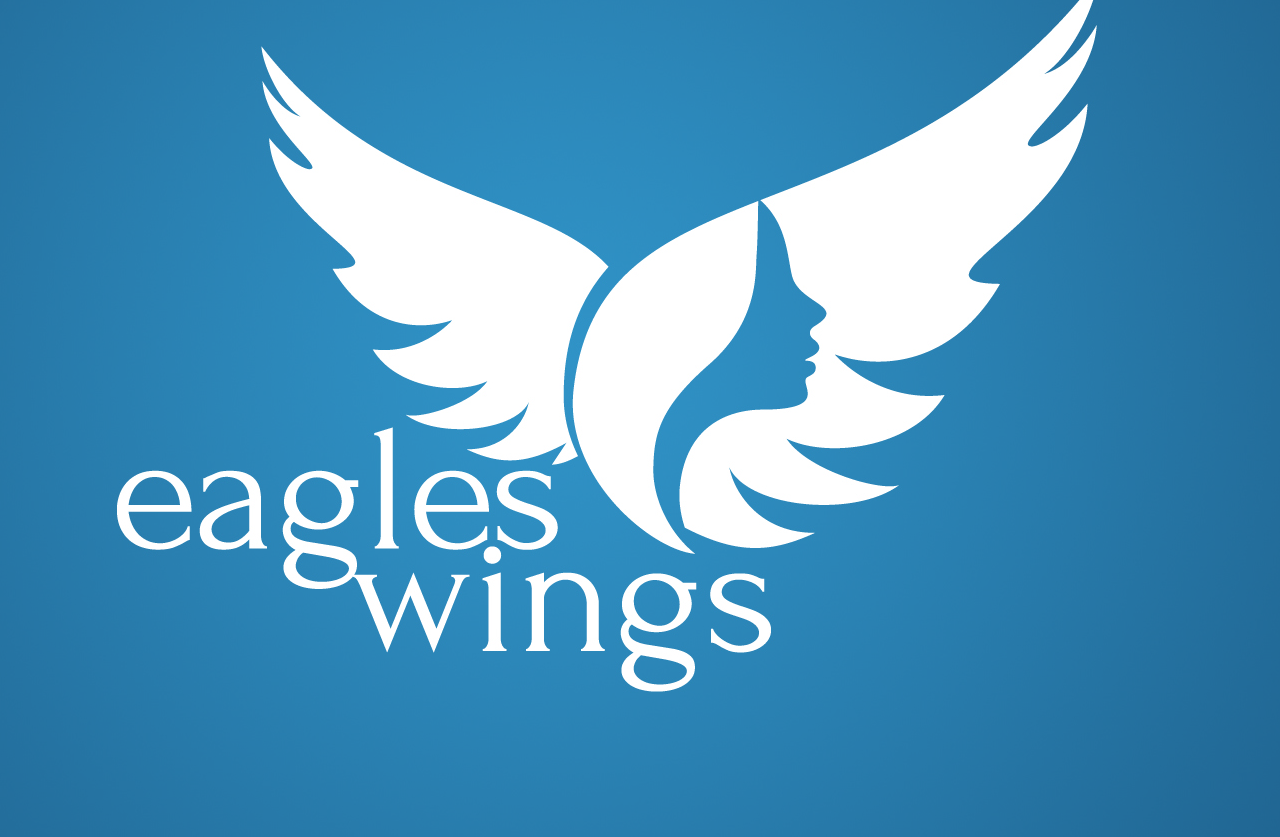 logo with a womans face inside open wings
